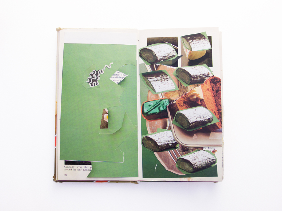 A double page spread of a recipe book. The left hand page has been collaged in mostly a flat green colour. The right hand page features small yule logs roughly cut out and applied and one green foil wrapped chocolate.