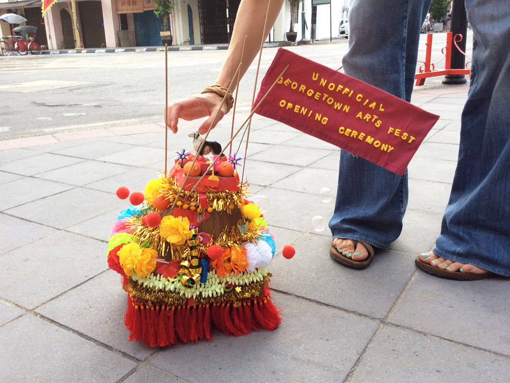 A part-temple, part carnival float sets off